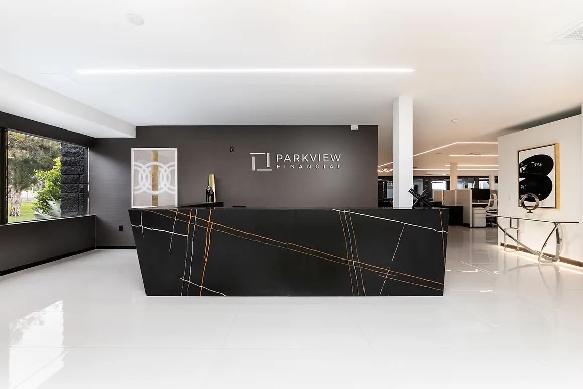 Stylish office reception area with marble counter- Nobel Builders